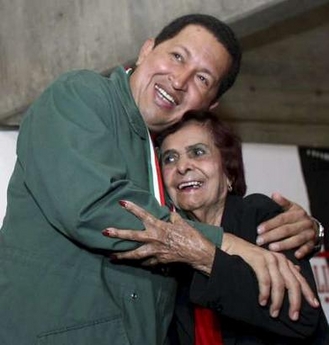 Hugo Chavez hugs Ana Maria Zapata