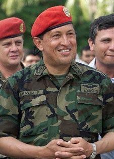 Hugo Chavez in camouflage and his iconic beret